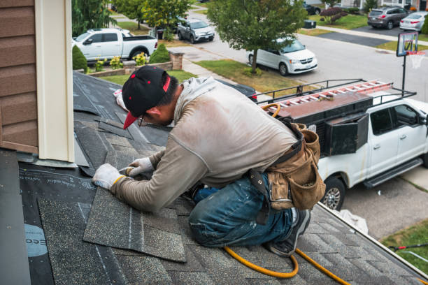 Professional Emergency Roof Repair technician working in Carson City, MI